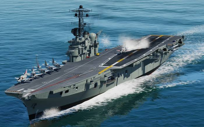HMAS Melbourne R21 aircraft carrier launching aircraft at sea